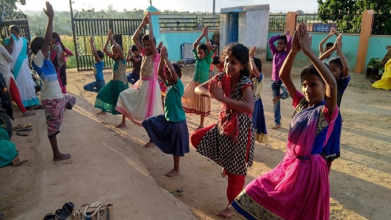 Children performing Yoga