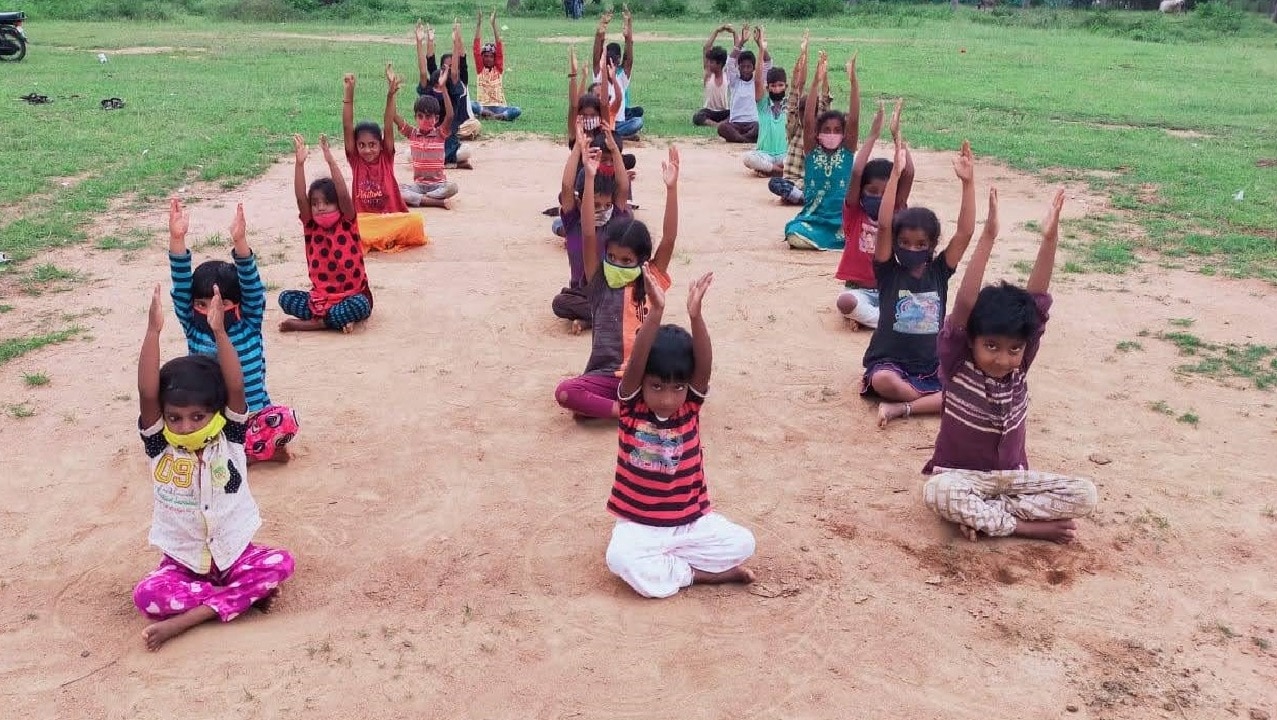 Children performing Yoga